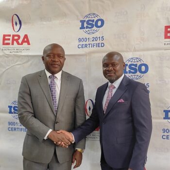 AfDB country representative Ngafuan with ERA's consumer and corporate affairs director Julius Wandera at the launch